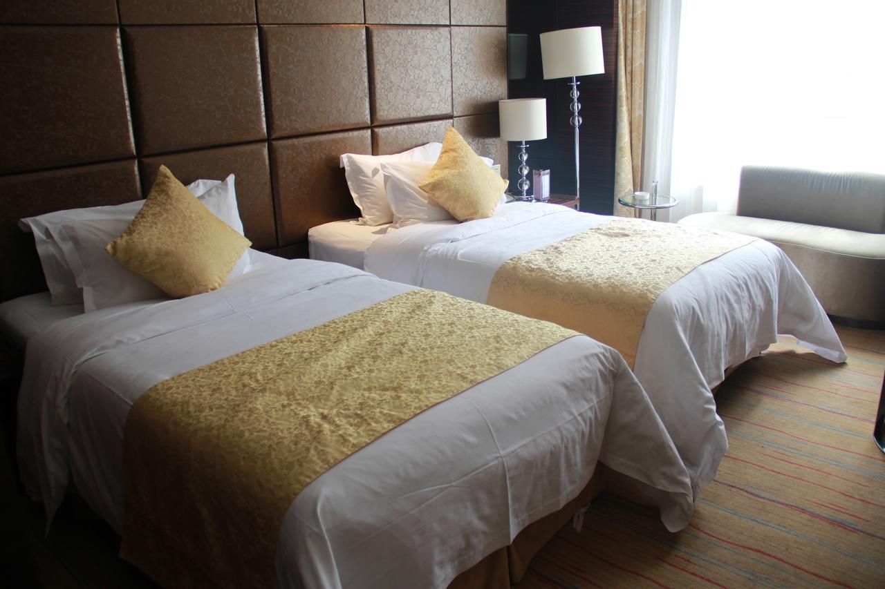 Huangjingang Holiday Hotel Jiexiu Zimmer foto