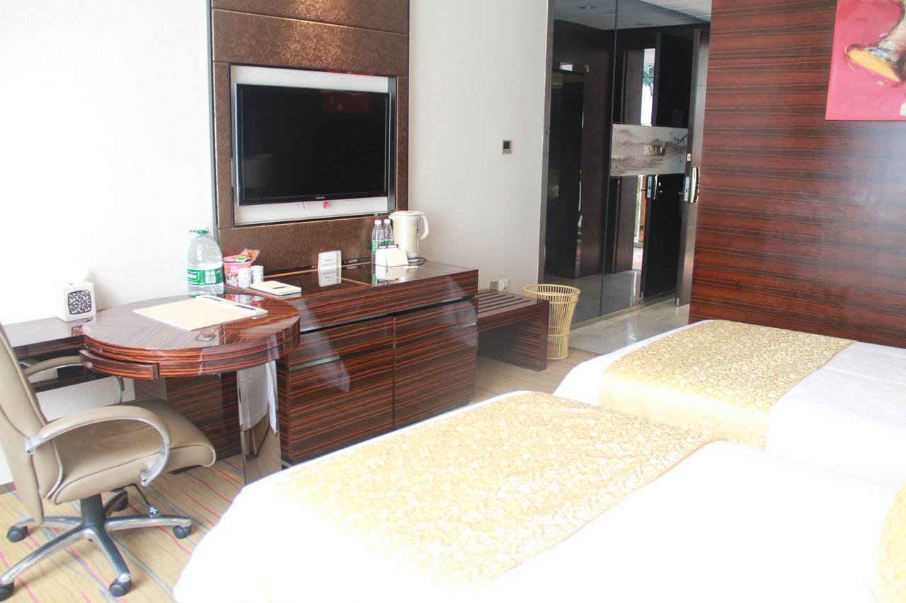 Huangjingang Holiday Hotel Jiexiu Zimmer foto